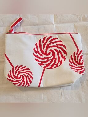 Clarins White Canvas Cosmetic Pouch with Red Swirl Lollipop Print